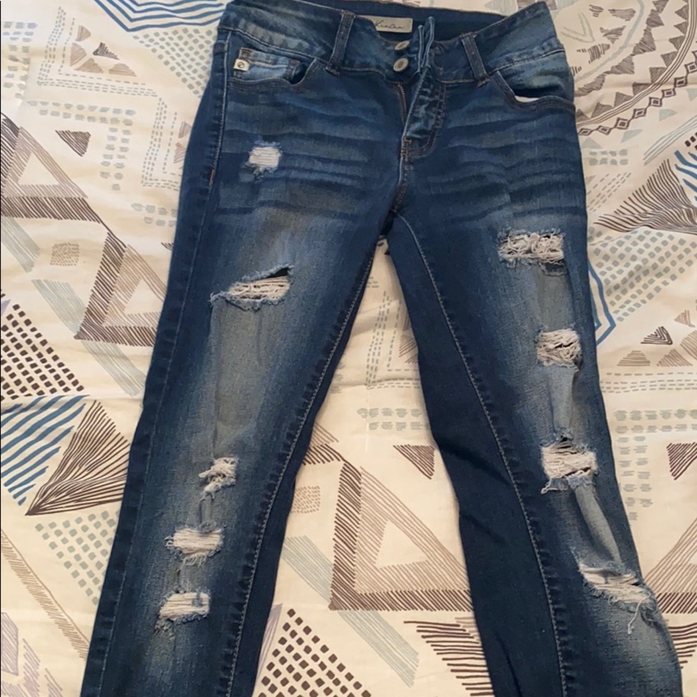 Ripped blue jeans